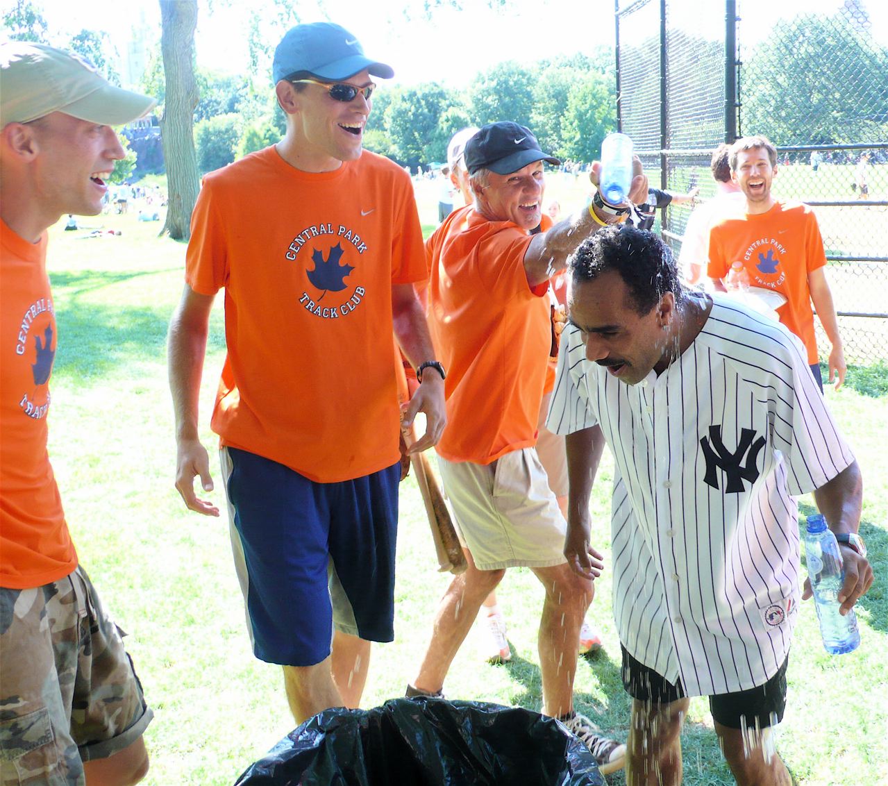 CPTC pitcher Fred Trilli nails coach Tony Ruiz with a bottle of water